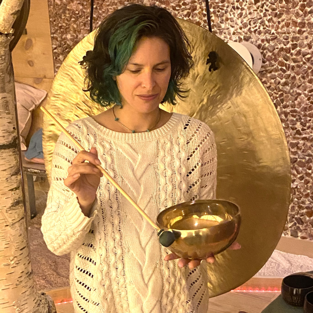 Katie singing bowl headshot in salt cave