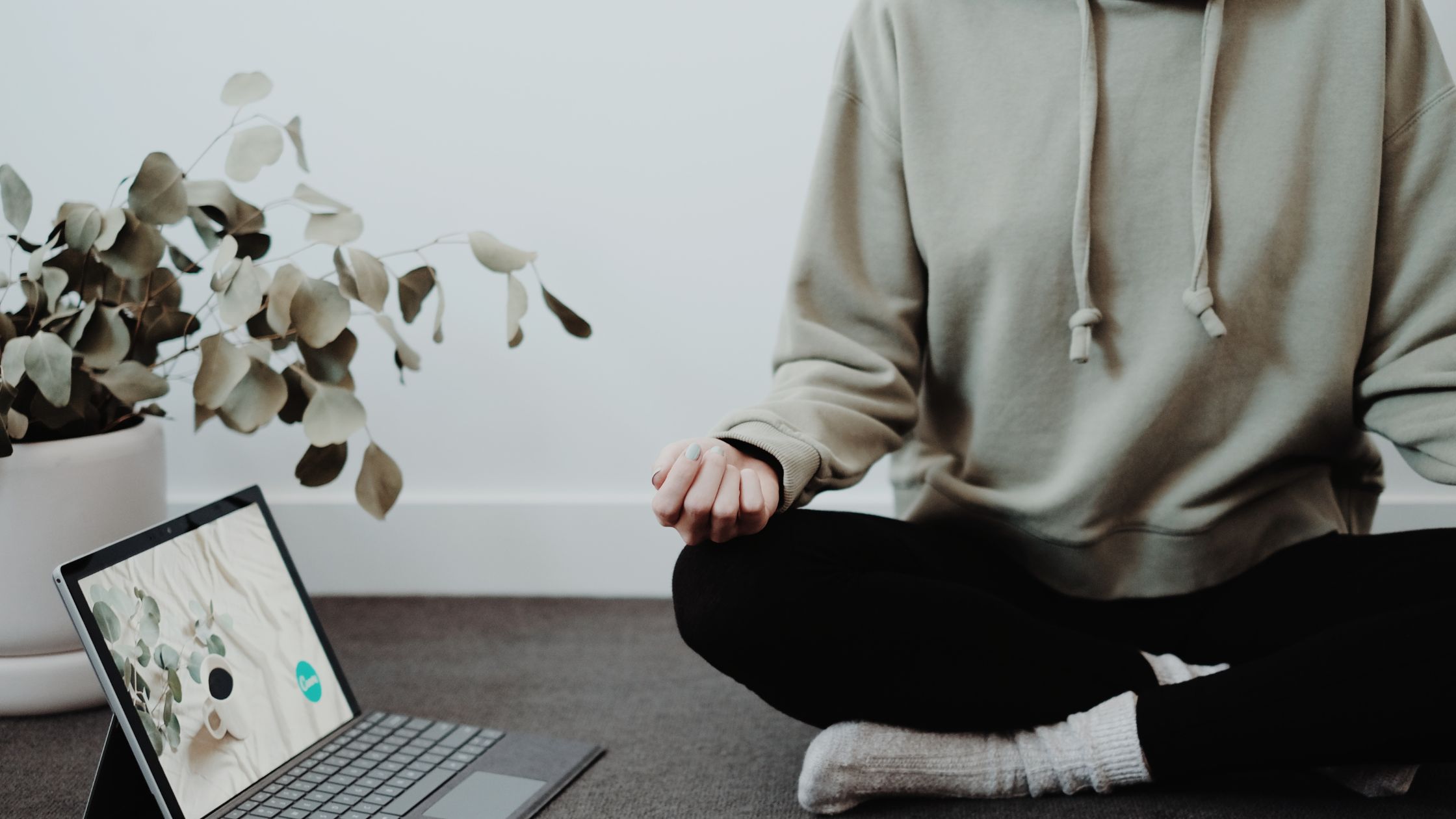 busy person sitting down to meditate