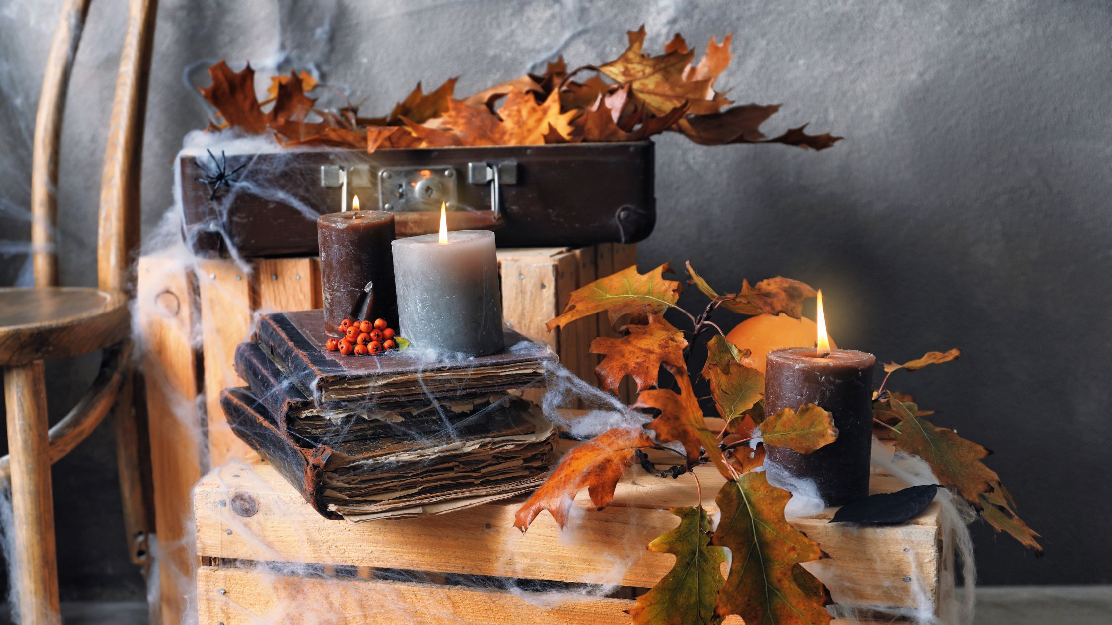 spooky books and candles for raven's psychic garden event