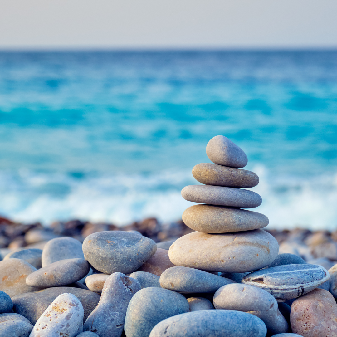 stacked rocks on a beach