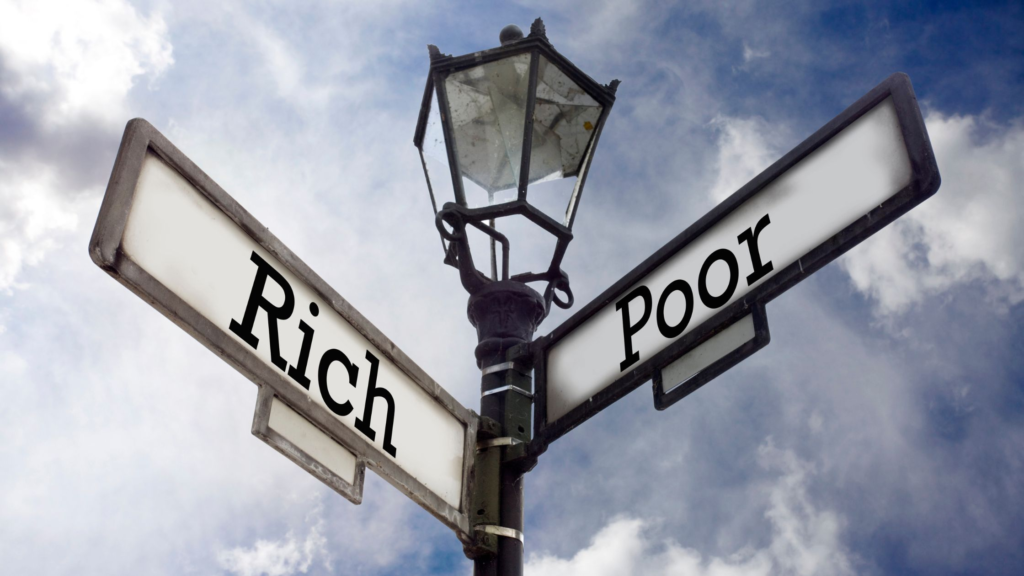 sign depicting rich or poor
